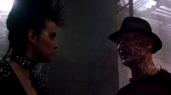 Movie still from “A Nightmare on Elm Street 3: Dream Warriors” (1987), directed by Chuck Russell – A man and a woman are talking to each other; Close Up shot, Over the shoulder angle