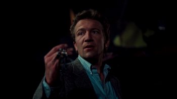 Movie still from “A Nightmare on Elm Street 3: Dream Warriors” (1987), directed by Chuck Russell – A person holding a cell phone; Close Up shot, Low angle