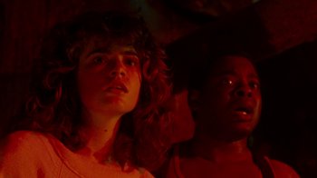 Movie still from “A Nightmare on Elm Street 3: Dream Warriors” (1987), directed by Chuck Russell – A woman and a man are looking at the camera; Close Up shot, Low angle