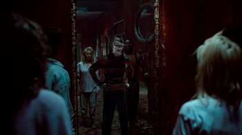 Movie still from “A Nightmare on Elm Street 3: Dream Warriors” (1987), directed by Chuck Russell – A group of people standing in a room; Medium shot, Low angle