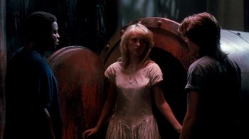 Movie still from “A Nightmare on Elm Street 4: The Dream Master” (1988), directed by Renny Harlin – A woman standing next to two men in front of a door; Medium shot, Over the shoulder angle