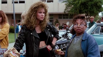 Movie still from “A Nightmare on Elm Street 4: The Dream Master” (1988), directed by Renny Harlin – A woman in a black jacket and a woman in a leather jacket; Medium shot, Low angle
