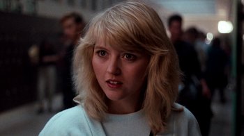 Movie still from “A Nightmare on Elm Street 4: The Dream Master” (1988), directed by Renny Harlin – A person wearing a white shirt; Close Up shot, Over the shoulder angle