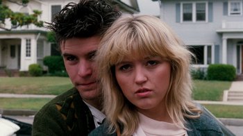 Movie still from “A Nightmare on Elm Street 4: The Dream Master” (1988), directed by Renny Harlin – A man and a woman standing next to each other; Close Up shot, Low angle