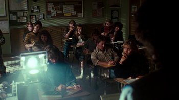 Movie still from “A Nightmare on Elm Street 4: The Dream Master” (1988), directed by Renny Harlin – A group of people sitting in a classroom; Wide shot, High angle