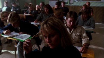 Movie still from “A Nightmare on Elm Street 4: The Dream Master” (1988), directed by Renny Harlin – A group of people sitting in a room; Close Up shot, High angle