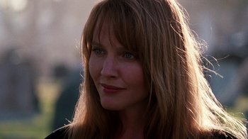 Movie still from “A Nightmare on Elm Street 4: The Dream Master” (1988), directed by Renny Harlin – A person with long brown hair; Close Up shot, Low angle
