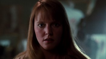 Movie still from “A Nightmare on Elm Street 4: The Dream Master” (1988), directed by Renny Harlin – A person with long red hair; Close Up shot, Low angle