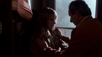 Movie still from “A Nightmare on Elm Street 4: The Dream Master” (1988), directed by Renny Harlin – A man and a woman are looking at each other; Medium shot, Over the shoulder angle