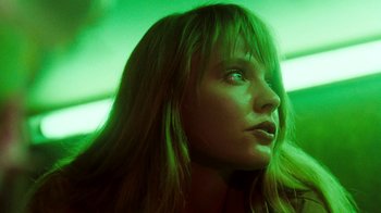 Movie still from “A Nightmare on Elm Street 4: The Dream Master” (1988), directed by Renny Harlin – A person with long blonde hair; Close Up shot, Low angle