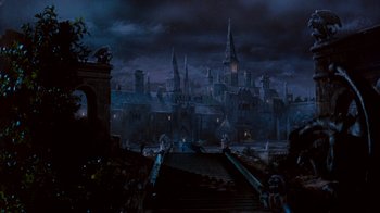 Movie still from “A Nightmare on Elm Street: The Dream Child” (1989), directed by Stephen Hopkins – A painting of an old city at night; Extreme Wide shot, High angle