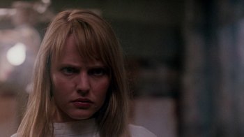 Movie still from “A Nightmare on Elm Street: The Dream Child” (1989), directed by Stephen Hopkins – A person with long blonde hair; Close Up shot, Low angle