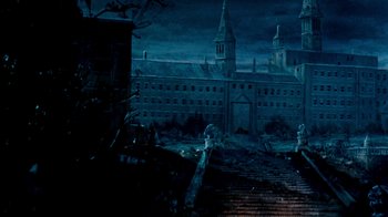 Movie still from “A Nightmare on Elm Street: The Dream Child” (1989), directed by Stephen Hopkins – An old building in the middle of the night; Extreme Wide shot, High angle