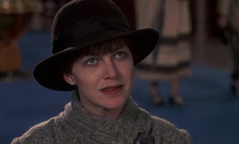 Movie still from “A Passage to India” (1984), directed by David Lean – A person wearing a hat; Close Up shot, Over the shoulder angle