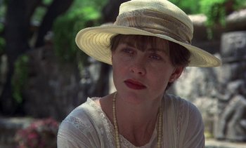 Movie still from “A Passage to India” (1984), directed by David Lean – A person wearing a hat; Close Up shot, Over the shoulder angle