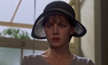 Movie still from “A Passage to India” (1984), directed by David Lean – A person wearing a hat; Close Up shot, Low angle