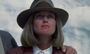 Movie still from “A Passage to India” (1984), directed by David Lean – A person wearing a hat; Close Up shot, Low angle