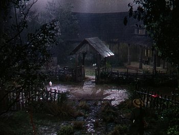 Movie still from “A Song to Remember” (1945), directed by Charles Vidor – A small hut in the middle of a rain storm; Extreme Wide shot, High angle