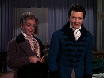 Movie still from “A Song to Remember” (1945), directed by Charles Vidor – A man and a woman dressed in period clothing; Medium shot, Over the shoulder angle