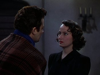 Movie still from “A Song to Remember” (1945), directed by Charles Vidor – A man and a woman talking to each other; Close Up shot, Over the shoulder angle