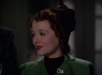 Movie still from “A Star Is Born” (1937), directed by Victor Fleming – A person wearing a hat; Close Up shot, Low angle
