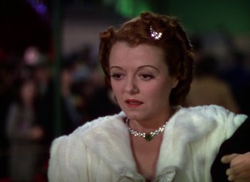 Movie still from “A Star Is Born” (1937), directed by Victor Fleming – A person wearing a necklace; Close Up shot, Low angle
