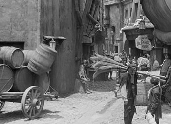 Movie still from “A Tale of Two Cities” (1935), directed by Jack Conway – An old photo of a street scene in a city; Extreme Wide shot, High angle