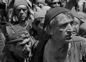 Movie still from “A Tale of Two Cities” (1935), directed by Jack Conway – A black and white photo of a group of people; Medium shot, High angle