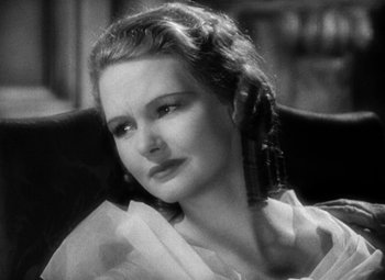 Movie still from “A Tale of Two Cities” (1935), directed by Jack Conway – An old black and white photo of a woman; Close Up shot, High angle