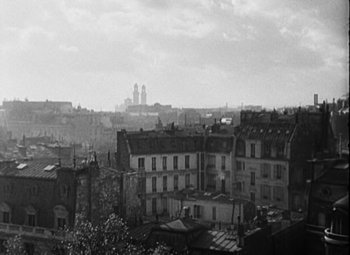 Movie still from “A Tale of Two Cities” (1935), directed by Jack Conway – A black - and - white photo of a city skyline; Extreme Wide shot, High angle