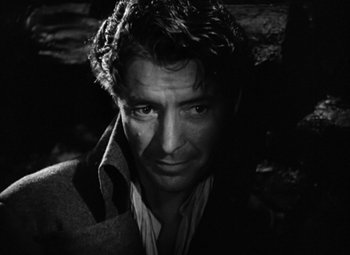 Movie still from “A Tale of Two Cities” (1935), directed by Jack Conway – Black and white photograph of a man in a jacket; Close Up shot, High angle