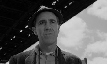 Movie still from “A Thousand Clowns” (1965), directed by Fred Coe – Black and white photograph of a man wearing a hat; Close Up shot, Low angle