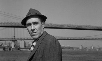 Movie still from “A Thousand Clowns” (1965), directed by Fred Coe – A black and white photo of a man wearing a hat; Close Up shot, Low angle