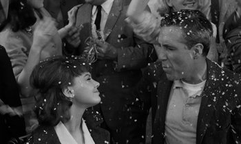 Movie still from “A Thousand Clowns” (1965), directed by Fred Coe – A group of people standing next to each other; Medium shot, High angle