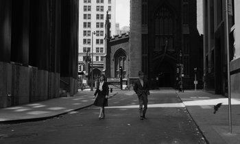 Movie still from “A Thousand Clowns” (1965), directed by Fred Coe – A man and a woman walking down a street; Wide shot, High angle