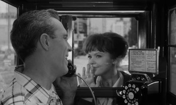 Movie still from “A Thousand Clowns” (1965), directed by Fred Coe – A man and a woman are talking on a phone; Close Up shot, Over the shoulder angle