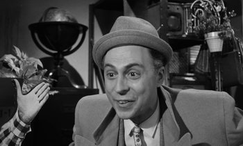 Movie still from “A Thousand Clowns” (1965), directed by Fred Coe – An older man wearing a hat and a suit; Close Up shot, High angle