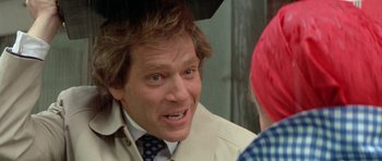 Movie still from “A Touch of Class” (1973), directed by Melvin Frank – A person talking to another person; Close Up shot, Over the shoulder angle