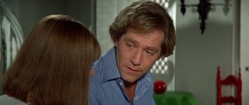 Movie still from “A Touch of Class” (1973), directed by Melvin Frank – A person talking to another person; Close Up shot, Over the shoulder angle