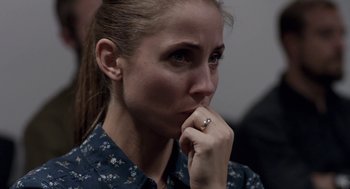 Movie still from “A War” (2015), directed by Tobias Lindholm – A person with a ring on her finger; Close Up shot, Over the shoulder angle