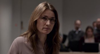 Movie still from “A War” (2015), directed by Tobias Lindholm – A person wearing glasses; Close Up shot, Over the shoulder angle