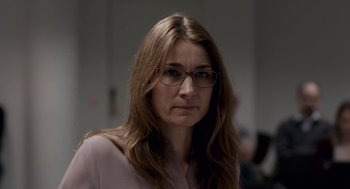 Movie still from “A War” (2015), directed by Tobias Lindholm – A person wearing glasses; Close Up shot, Low angle