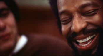 Movie still from “A Woman Under the Influence” (1974), directed by John Cassavetes – A man's face with his eyes closed; Extreme Close Up shot, Low angle