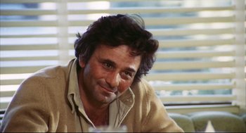 Movie still from “A Woman Under the Influence” (1974), directed by John Cassavetes – A person sitting in front of a window; Close Up shot, Low angle