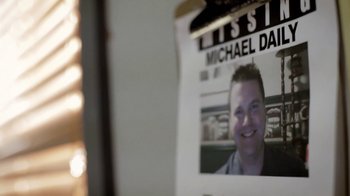 Movie still from “Absentia” (2011), directed by Mike Flanagan – A person's id card; Extreme Close Up shot, Overhead angle