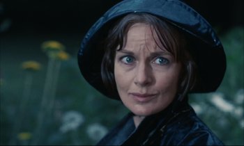 Movie still from “Accident” (1967), directed by Joseph Losey – A person wearing a hat; Close Up shot, Over the shoulder angle