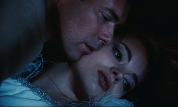 Movie still from “Accident” (1967), directed by Joseph Losey – A man and a woman laying on the ground; Close Up shot, Low angle