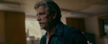 Movie still from “Acidman” (2022), directed by Alex Lehmann – An older man with a beard; Close Up shot, Over the shoulder angle