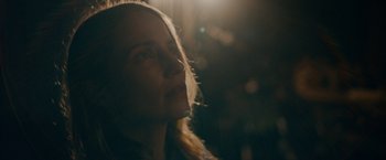 Movie still from “Acidman” (2022), directed by Alex Lehmann – A person looking at the camera; Close Up shot, Low angle