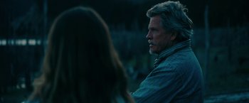 Movie still from “Acidman” (2022), directed by Alex Lehmann – An older man and a young woman are looking at each other; Close Up shot, Over the shoulder angle